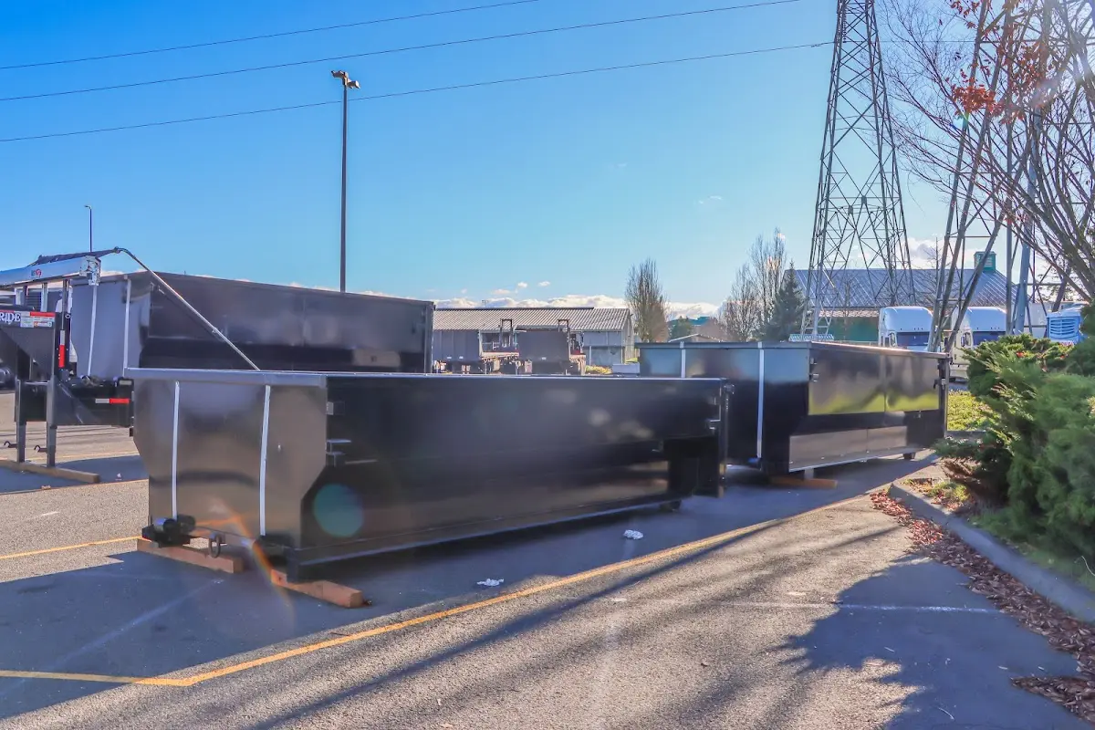 Roll-off dumpster ready for waste disposal at job site for Roofing Dumpster Rental in Hampton